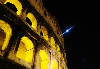 The moon and the Colosseum together side by side...